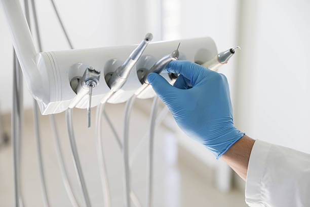 Professional Tooth Extraction technician working in Saranac, MI